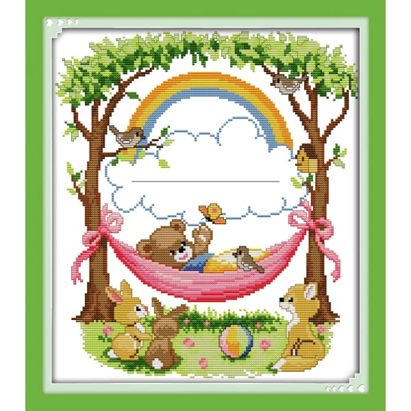 The bear plays on the swing