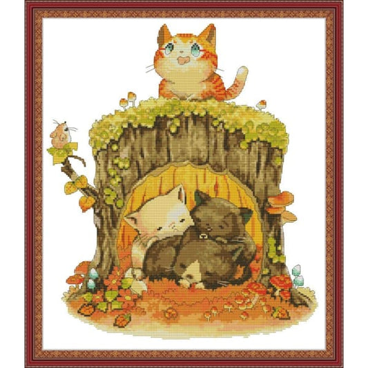 Kitten under the stump
